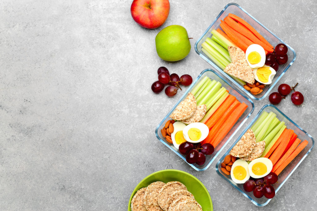 Lunch boxes with healthy snacks, overhead view